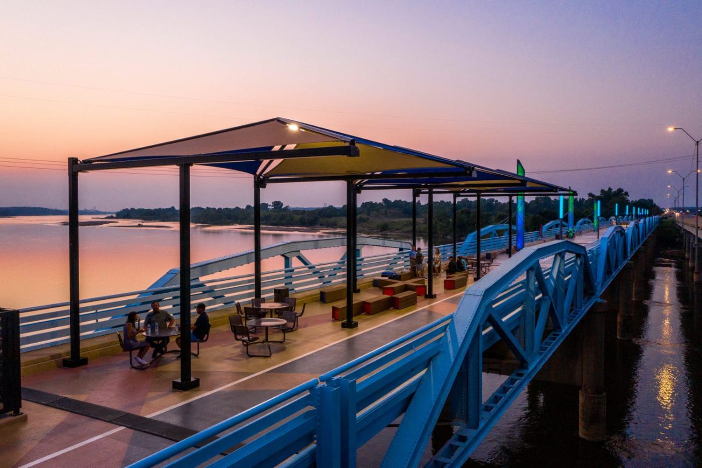 The Harmony bridge over the Arkansas River in Bixby at sunset